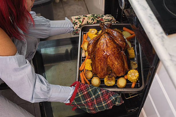 istock Preparing turkey for Thanksgiving Day 2240165630