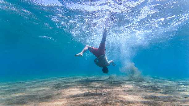 istock Child Diving Underwater in the Aegean Sea 2240165672