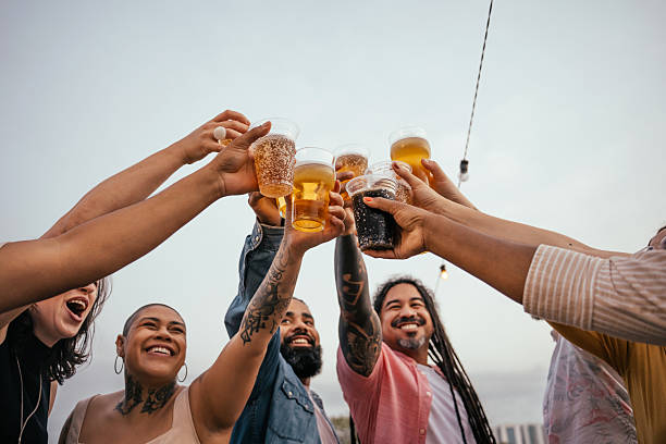 istock Friends toasting at a get-together 2240166991