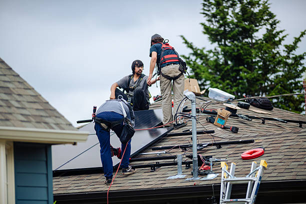 istock Professional Engineers installing solar panels on home roof 2240169673
