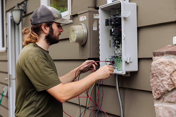 istock Electrician Wiring Up Solar Panel System Fuse Box 2240169716