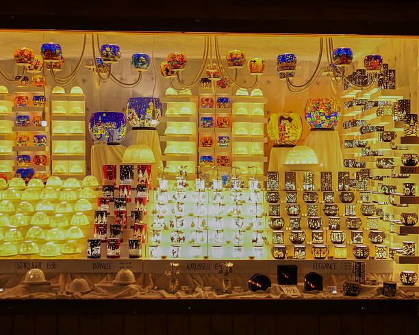 A display of intricately designed moving lanterns for sale at a vendor stall at the Zurich Christmas Market, Switzerland