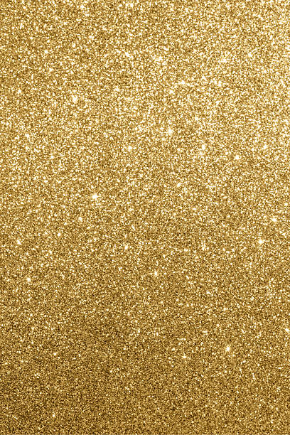 istock Golden shimmering background with sparkling texture for decorative festive uses 2240171790