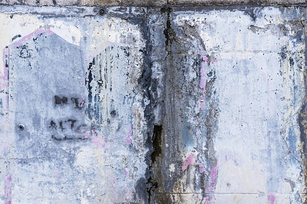istock A cement wall covered in paint chipped by humidity 2240172056