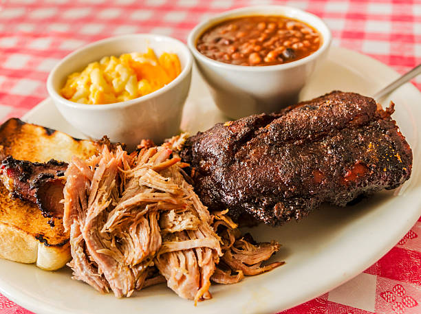 istock Smoked ribs, pulled pork and brisket in Tucker Georgia 2240180117