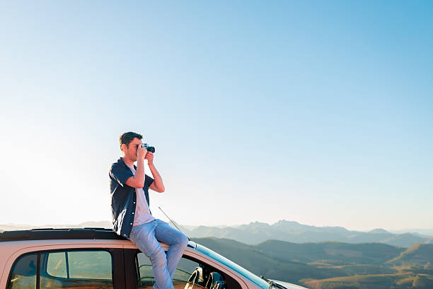 istock Traveler photographing mountain landscape 2240181190