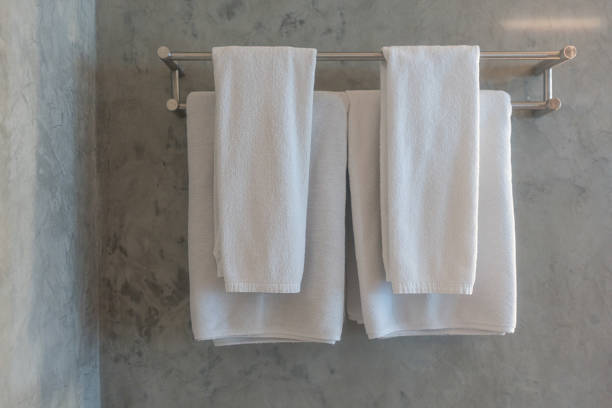 istock Minimalist silver metallic towel rack hanging fixture. 2240185180
