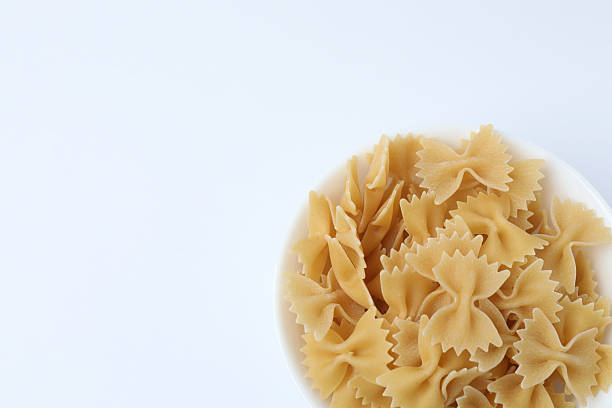 Raw pasta isolated on a white background, contour.
