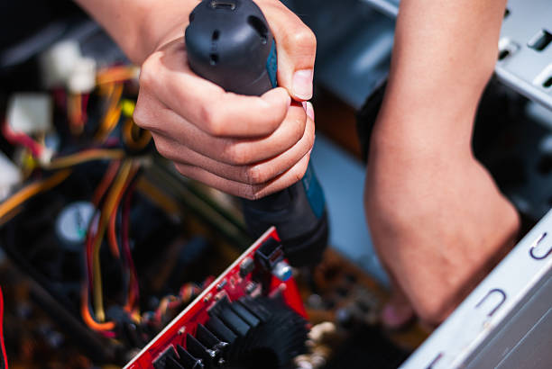 istock Repairing a computer tech workshop action indoor environment close-up view technical skills 2240207135
