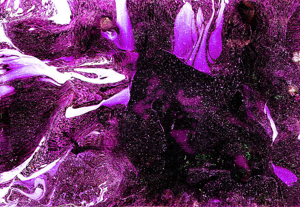 istock Vibrant abstract marbled paper texture in purple and black with fluid swirls and organic shapes. 2240209597