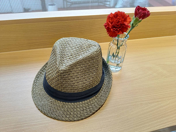 istock summer hat and flower vase 2240209960