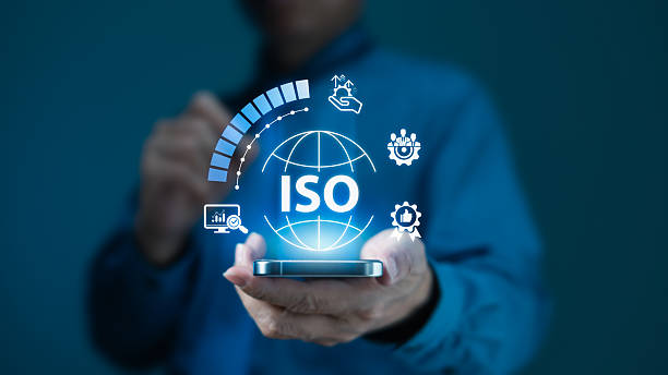 istock Businessman Displaying ISO Certification and Quality Management on Smartphone 2240211906