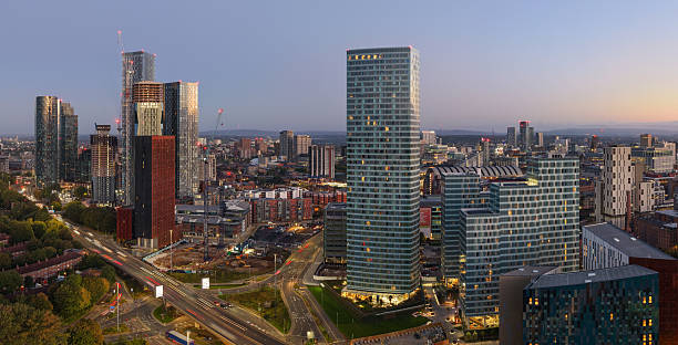istock Aerial long exposure image over Princess Road showing Manchester’s skyline 2240212852