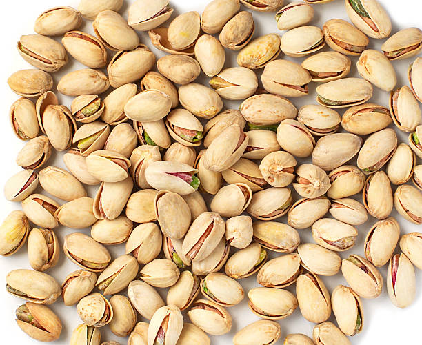 istock Top view of Pistachios as background texture 2240213687