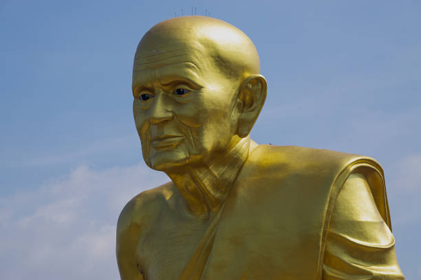 Golden Buddha Statues placed for merit in Buddhist ceremonies Asia
