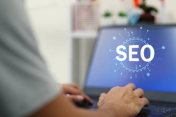 istock Person Typing on Laptop with SEO Concept in Background 2240216844