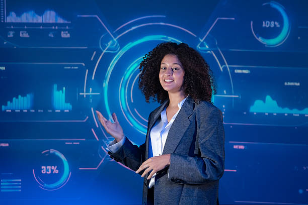 istock Data scientist or business analyst presenting key performance indicators (KPIs) on a futuristic dashboard UI. 2240219239
