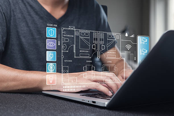 istock Innovative Home Design Planning with Digital Blueprint on Laptop 2240221864