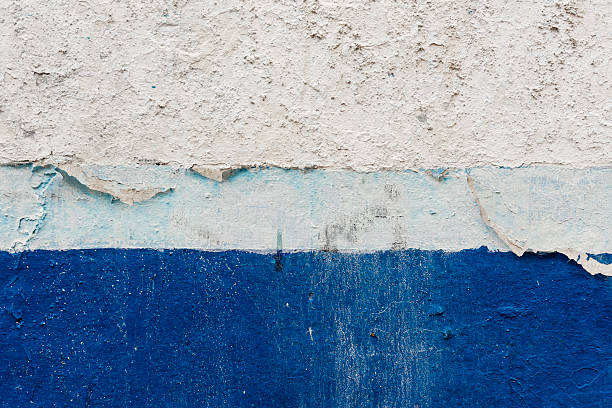istock Peeling blue paint texture with various shades of blue. Vector cement and paint texture 2240222246