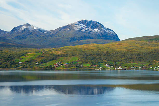 Scenic and tranquil view of Fjord landscape and reflection in Northern Norway