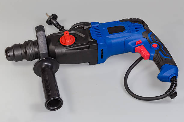 istock Electric rotary hammer drill on a gray background 2240226166