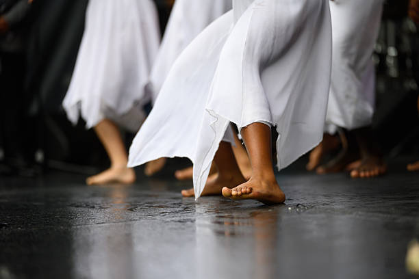 Close-up view of legs with bells tied of Indian tribal dancer performing in outdoors
