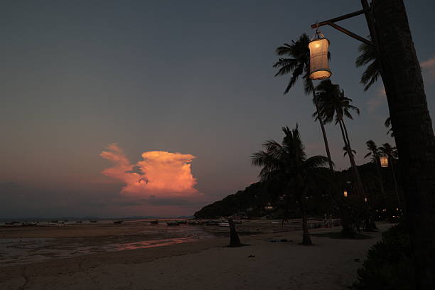 istock Phi Phi beach in Thailand after sunset illuminated by last rays of sunlight and paper lanterns before nightfall 2240235666
