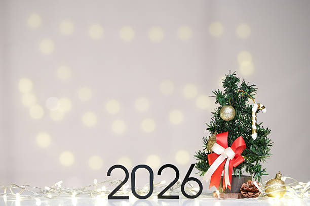 istock Festive Decor. Mini Christmas tree and 2026 for holiday spirit. 2240236997
