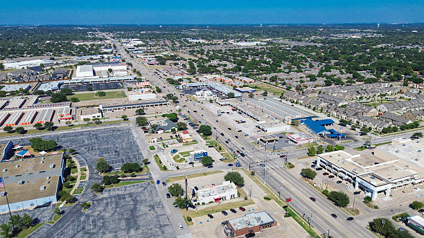 istock Downtown North Richland Hills, Texas showing freeway-front retail pads, restaurant zones, storage facility, business park, residential neighborhoods with organized street grids and green buffers 2240237002