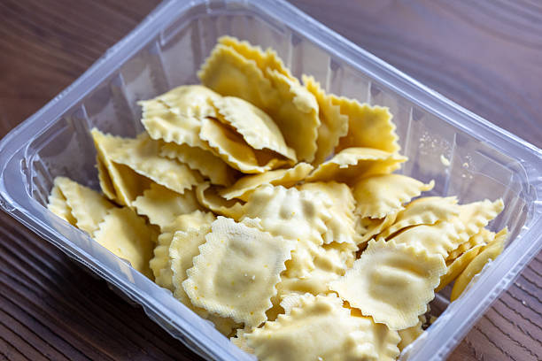istock Homemade ravioli on wooden table 2240237361