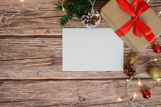 istock Christmas Gift Box and Blank Card with Decorations 2240240654