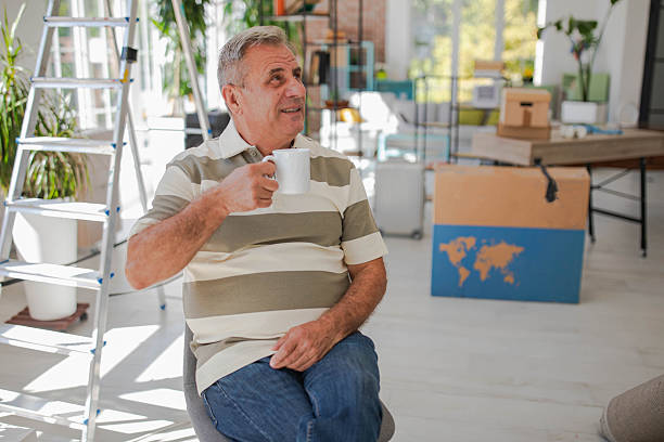istock An old bachelor moves into a new apartment, a new beginning 2240242696