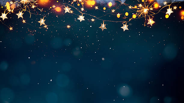 istock Christmas lights and sparkling stars background 2240243690