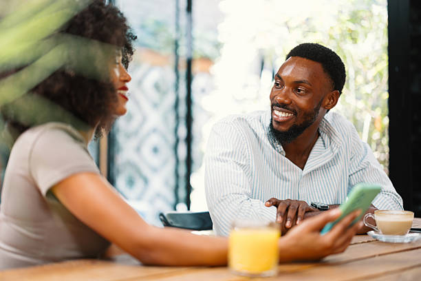 istock Couple having coffee date in cafe 2240244813