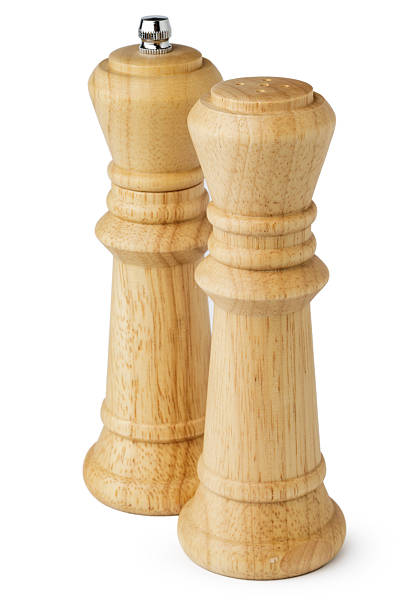 istock Wooden mills with salt and pepper on white 2240245567
