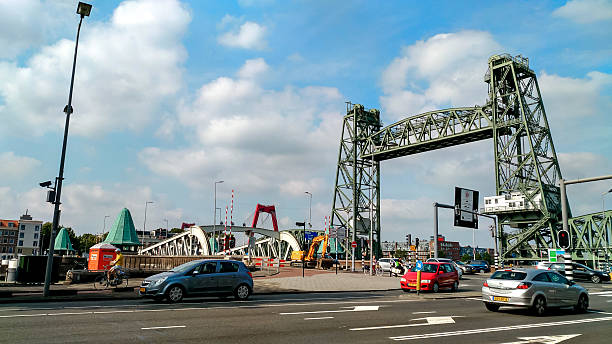 Rotterdam, Netherlands - August 22, 2018 - Rotterdam skyline with hef bridge and willemsbrug on a sunny day.