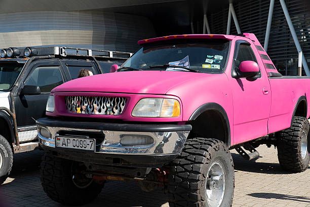 Portrait of tourist woman in off road car on the beach, Rio Grande do Norte, Brazil