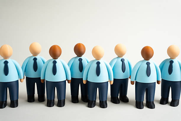 istock Office worker figurines. Office work. Hiring and recruiting. Career development. Candidate pool 2240249417