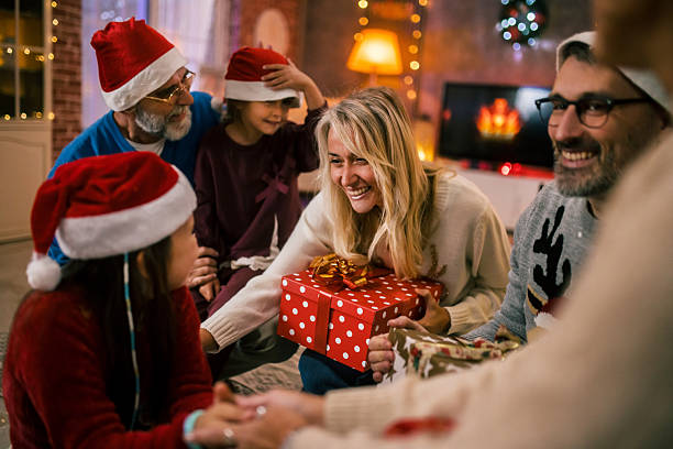 istock Three generations celebrating Christmas holidays together 2240255763