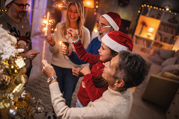 istock Three generations celebrating Christmas holidays together 2240255806
