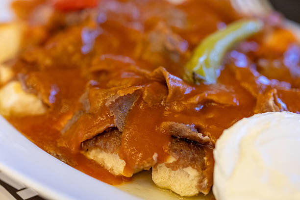 istock Local Turkish dish Iskender doner on an oval plate 2240258404