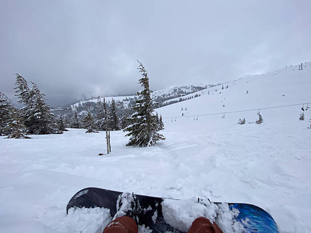 istock Snowboard on Snowy Mountain Slope 2240258920