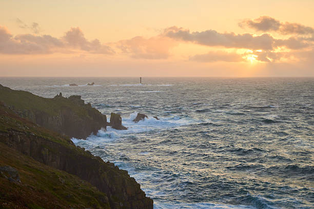 Land's End coastline, Cornwall, England, UK during sunset