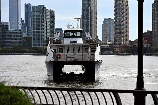East River Ferry arriving at 34th Street with Long Island City in background
