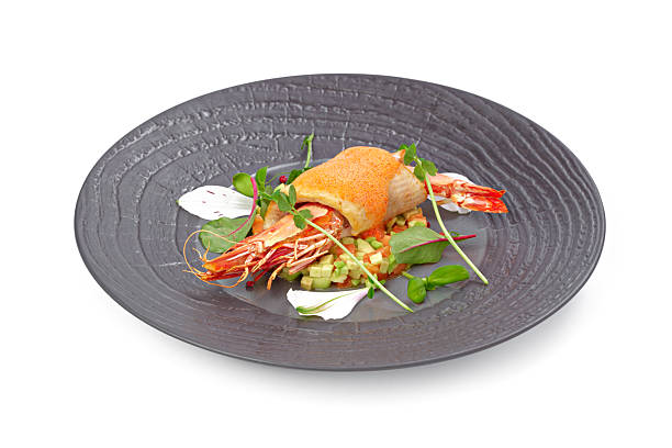 Grilled king prawn on grey plate isolated on white background