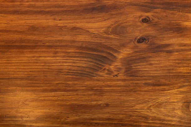 Wooden table top viewed from above with pronounced knots and grain. Vector wood texture background
