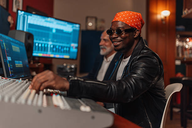 istock Engaged Musicians Work on Sound Mixing Together 2240268816