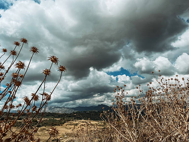 Vast mountainous landscape with cloudy sky. Andalusia, Spain.