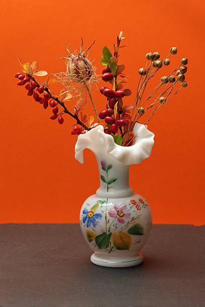 istock Still life with natural objects in milk glass vase. 2240270108