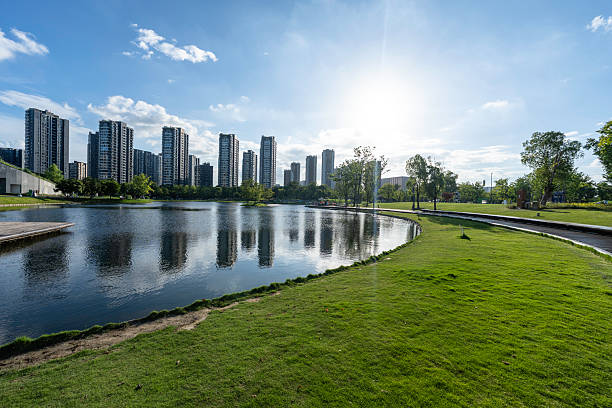 istock green lawn with city skyline in park 2240270782